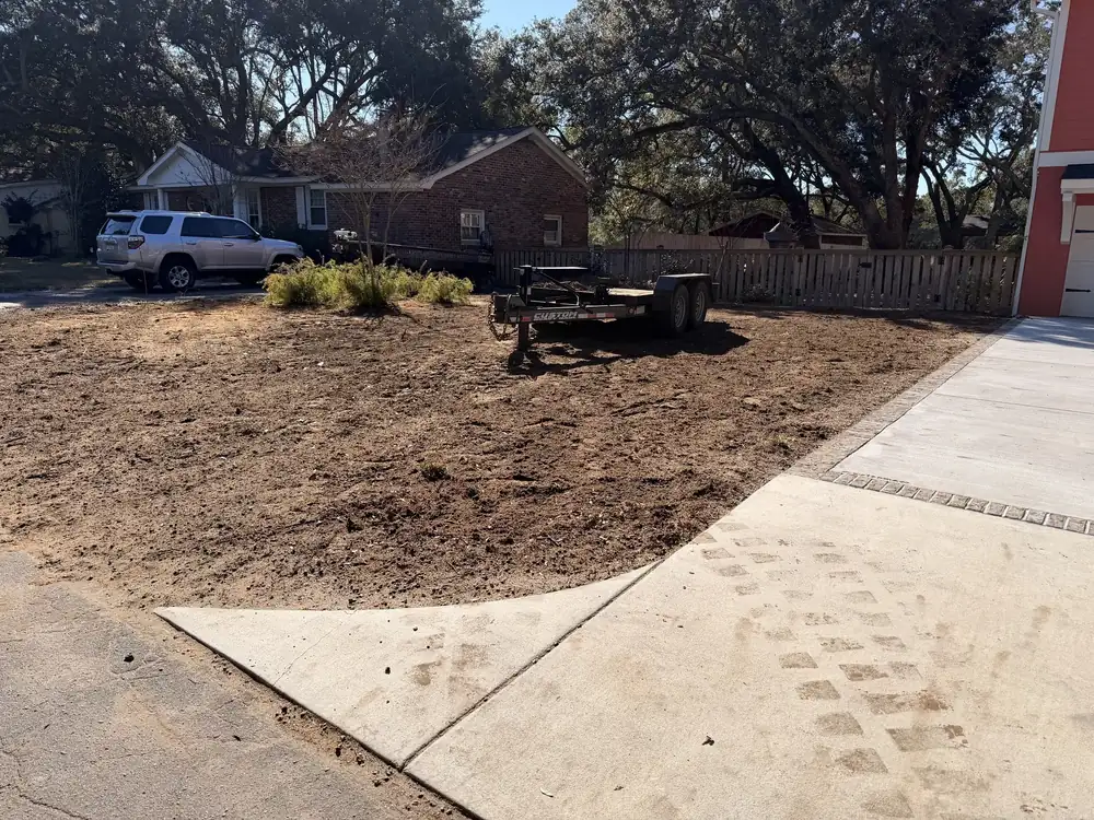 Lot graded flat up to a new sidewalk